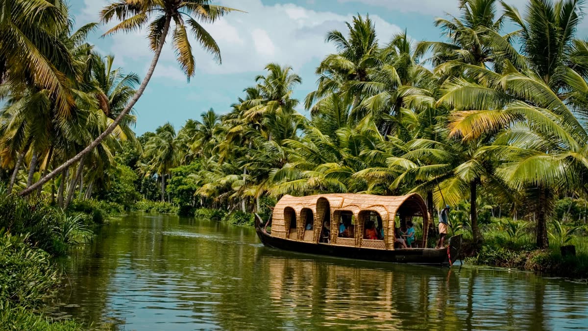Kerala backwaters scene representing local businesses using WhatsApp broadcast